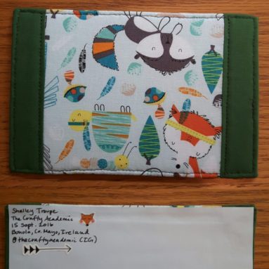 Back and front of first fabric postcard